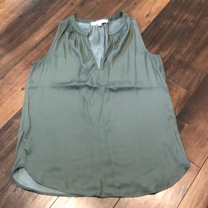 Green sleeveless blouse